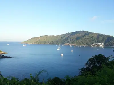a view of a large body of water with boats at Rawai Condotel 3 in Rawai Beach