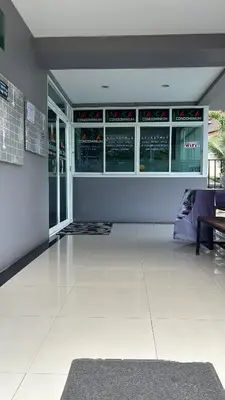 a large room with a white floor and windows at Phuket naka condon-52-25 \u6cf3\u6c60\u9ad8\u901f\u4e0a\u7f51\u514d\u8d39\u505c\u8f66 in Phuket Town