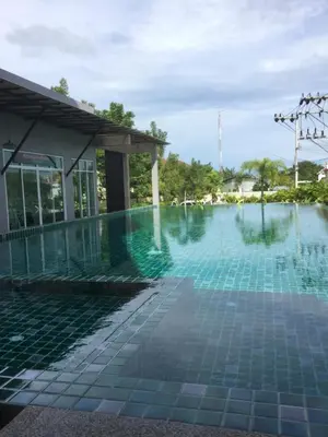 a swimming pool at a resort at Phuket naka condon-52-25 \u6cf3\u6c60\u9ad8\u901f\u4e0a\u7f51\u514d\u8d39\u505c\u8f66 in Phuket Town