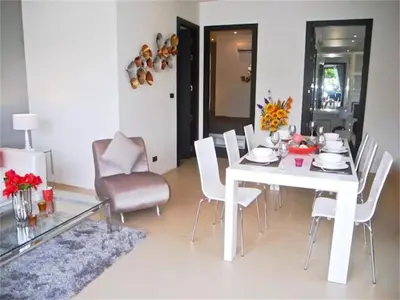 a dining room with a white table and chairs at COCO Chalong 2 bedrooms New Villa in Chalong
