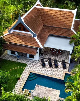 an aerial view of a house with a swimming pool at Champagne Villa by G Estate in Rawai Beach