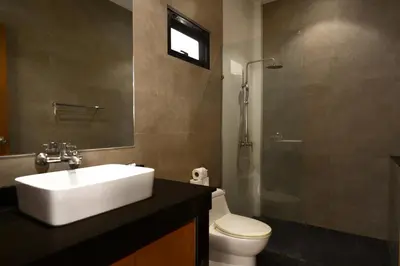 a bathroom with a sink and a toilet and a shower at Emotion 2 Villa by G Estate in Rawai Beach