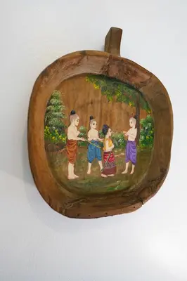 a picture of a group of children in a wood frame at La Romanee Infinity by G Estate in Rawai Beach
