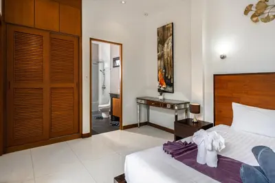 a hotel room with a bed and a bathroom at Emotion 1 Villa by G Estate in Rawai Beach
