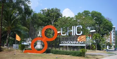 a large sign that reads caffe colombia on a fence at Chic Condominium Unit A303, A306, A307, A308, A406 in Karon Beach