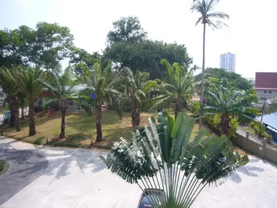 an aerial view of a park with palm trees at Chic Condominium Unit A303, A306, A307, A308, A406 in Karon Beach