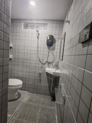 a bathroom with a toilet and a sink at Nemo 2 Resort in Ao Nang Beach