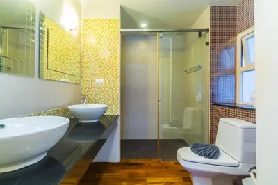 a bathroom with a sink and a toilet and a shower at Heaven Lagoon Condo by Lofty in Patong Beach