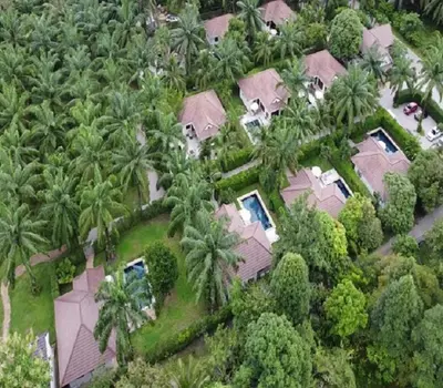 an aerial view of a house with palm trees at Alisea Pool Villa Aonang in Ao Nang Beach