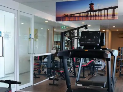 a gym with treadmills and a treadmill at Clarian Hotel Beach Patong in Patong Beach