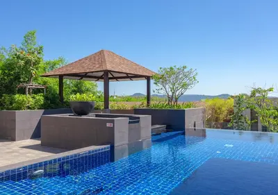 a swimming pool with a gazebo next to a swimming pool at CASABAY Luxury Pool Villas by STAY in Rawai Beach