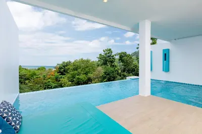 a view of a swimming pool from a villa at Amala Grand Bleu Resort Hilltops - SHA in Kamala Beach