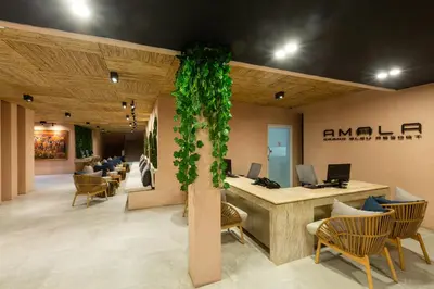 an office with a lobby with chairs and a desk at Amala Grand Bleu Resort Hilltops - SHA in Kamala Beach