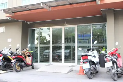 a group of motorcycles parked outside of a building at Dcondo Kathu Patong Phuket by Jack in Kathu