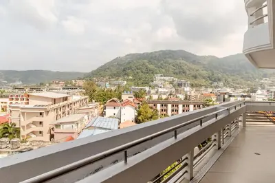 a balcony with a view of a city at Andaman Sea View Apartment - Patong Beach in Patong Beach