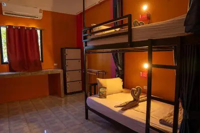 a room with two bunk beds in a dorm at K-Bunk AoNang Center in Ao Nang Beach