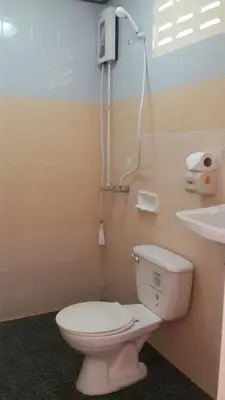 a bathroom with a toilet and a sink at Phi Phi View Point Resort in Phi Phi Don