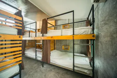 a group of bunk beds in a room at ChillHub Hostel Phuket in Bang Tao Beach