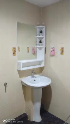a bathroom with a white sink and a mirror at Baan Asree homestayบ้านอัสรี in Ao Nang Beach
