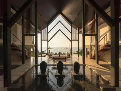 a house with a pool with a view of the ocean at Villa Samira by Elite Havens in Kamala Beach