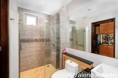 a bathroom with a shower and a toilet at Sea & Sky Karon Beach by PHR in Karon Beach