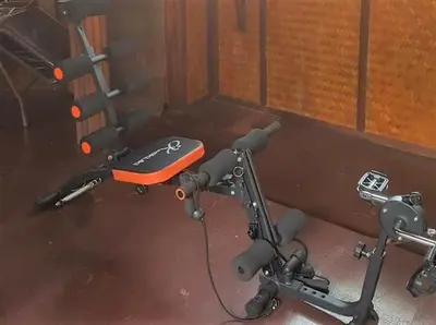 a exercise bike sitting on the floor in a room at Tropical Garden Bungalow in Phi Phi Don