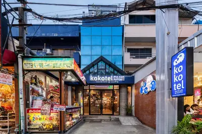 a group of shops on a city street at Kokotel Phuket Patong in Patong Beach