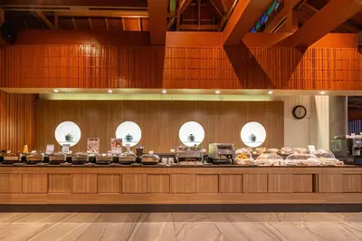 a buffet line with a lot of food at Orchidacea Resort - Kata Beach in Kata Beach