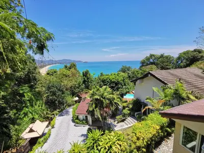 an aerial view of a resort with the ocean in the background at On The Hill Karon Resort in Karon Beach