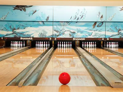 a red bowling ball in a bowling alley at Phuket Graceland Resort and Spa in Patong Beach