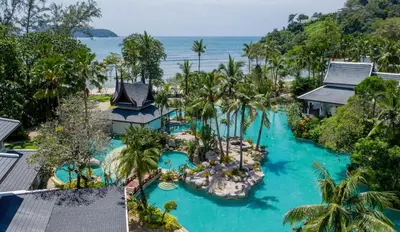 an aerial view of the pool at the resort at Thavorn Beach Village Resort & Spa Phuket in Kamala Beach