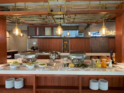a kitchen with a counter with food on it at R-Mar Resort and Spa Patong, Phuket in Patong Beach