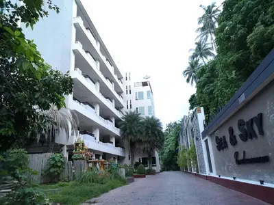 an empty street in front of a building at Sea and Sky Condominium Room #406 in Karon Beach