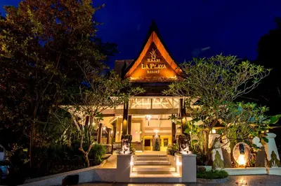 a building with a lit up sign on top of it at Krabi La Playa Resort in Ao Nang Beach