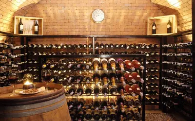 a room filled with lots of bottles of wine at Mangosteen Ayurveda & Wellness Resort - SHA Plus in Rawai Beach