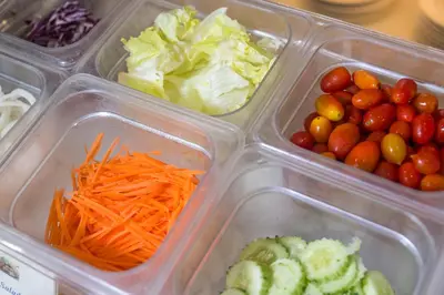 a plastic container filled with different types of vegetables at Aonang All Seasons Beach Resort in Ao Nang Beach
