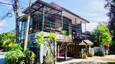 a building with a lot of windows at The Endless Bangtao Residence 1987 in Bang Tao Beach