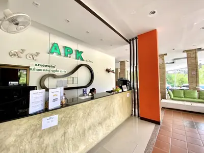 a restaurant with an apple sign on the wall at APK Resort Patong in Patong Beach