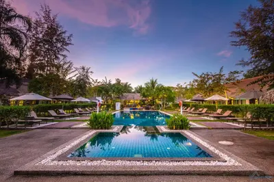 an image of a swimming pool at a resort at Krabi Aquamarine Resort - SHA Plus in Ao Nang Beach