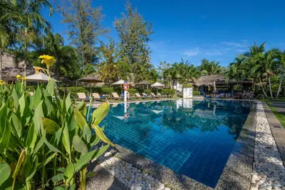 a swimming pool at the resort at Krabi Aquamarine Resort - SHA Plus in Ao Nang Beach