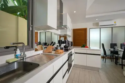 a kitchen with a sink and a counter at VILLA RAJA 4BR Private pool villa in Rawai Beach