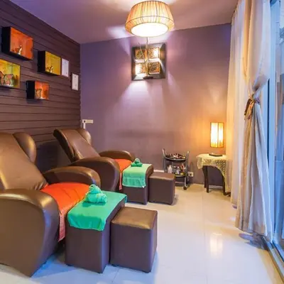 a waiting room with couches and chairs and a table at Baan Ban Dalay in Ao Nang Beach