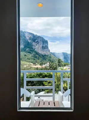 a window with a view of a mountain view at The Palace Aonang Resort in Ao Nang Beach