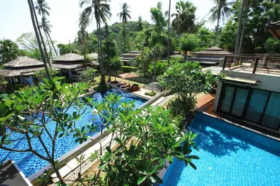 an aerial view of a resort with a swimming pool at Niramaya Villa & Wellness in Ko Yao Noi
