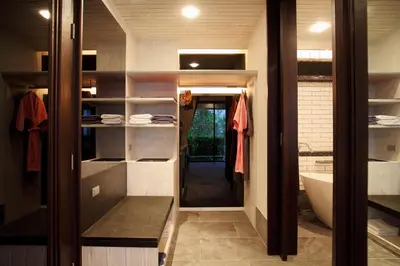 a bathroom with a sink and a bath tub at Baba Beach Club Phuket Natai Luxury Pool Villa Hotel by Sri panwa in Natai Beach