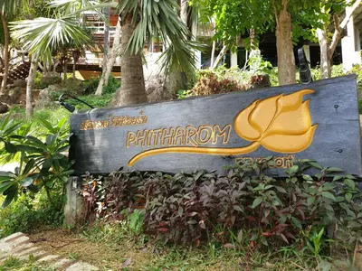 a wooden sign for ahibricularonia in a park at Phitharom PP Resort in Phi Phi Don