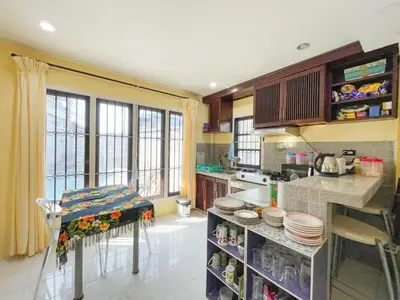 a kitchen with a counter with dishes on it at The Endless Resident Private Pool Villa PSU in Bang Tao Beach