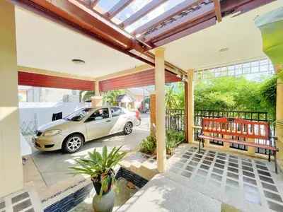 a patio with a car parked in a parking lot at The Endless Resident Private Pool Villa PSU in Bang Tao Beach