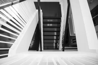 a black and white photo of a stairway at Shunli Hotel - SHA Extra Plus in Phuket Town