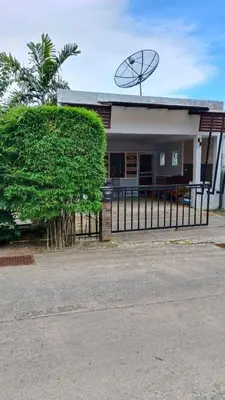 a house with a large antenna on top of it at The Endless Bangtao Residence CAC 3 in Bang Tao Beach